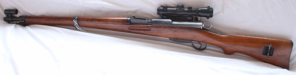 Schmidt Rubin K31 rifle scoped. S/H-image